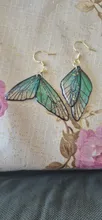 Avis clients – Boucles d'oreilles résine ailes dégradées strass papillon
