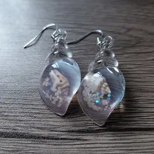Avis clients – Boucles d'oreilles résine coquillage style plage été