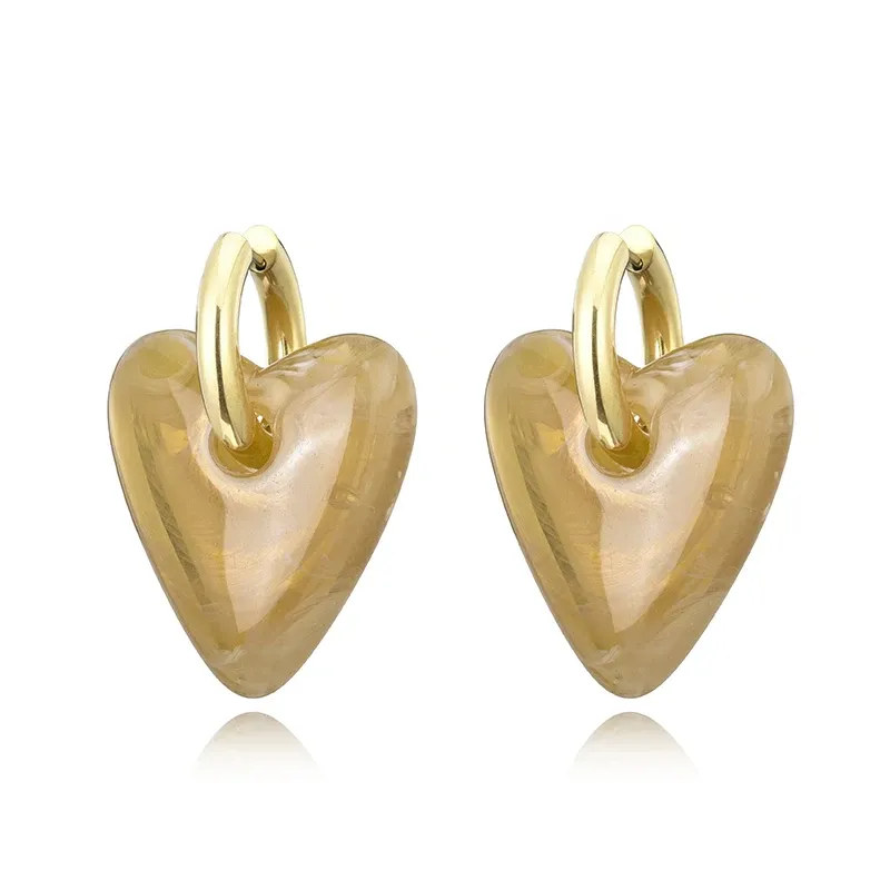 Boucles d'oreilles créoles résine cœur or pour femme