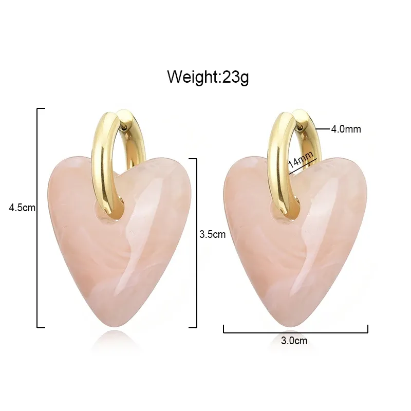 Boucles d'oreilles créoles résine cœur or pour femme