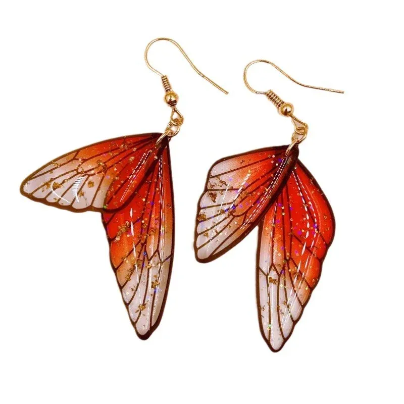 Boucles d'oreilles résine ailes dégradées strass papillon
