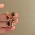 Boucles d'oreilles résine asymétriques géométriques rétro – 5