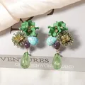 Boucles d'oreilles résine et zircon fleurs style baroque – 4