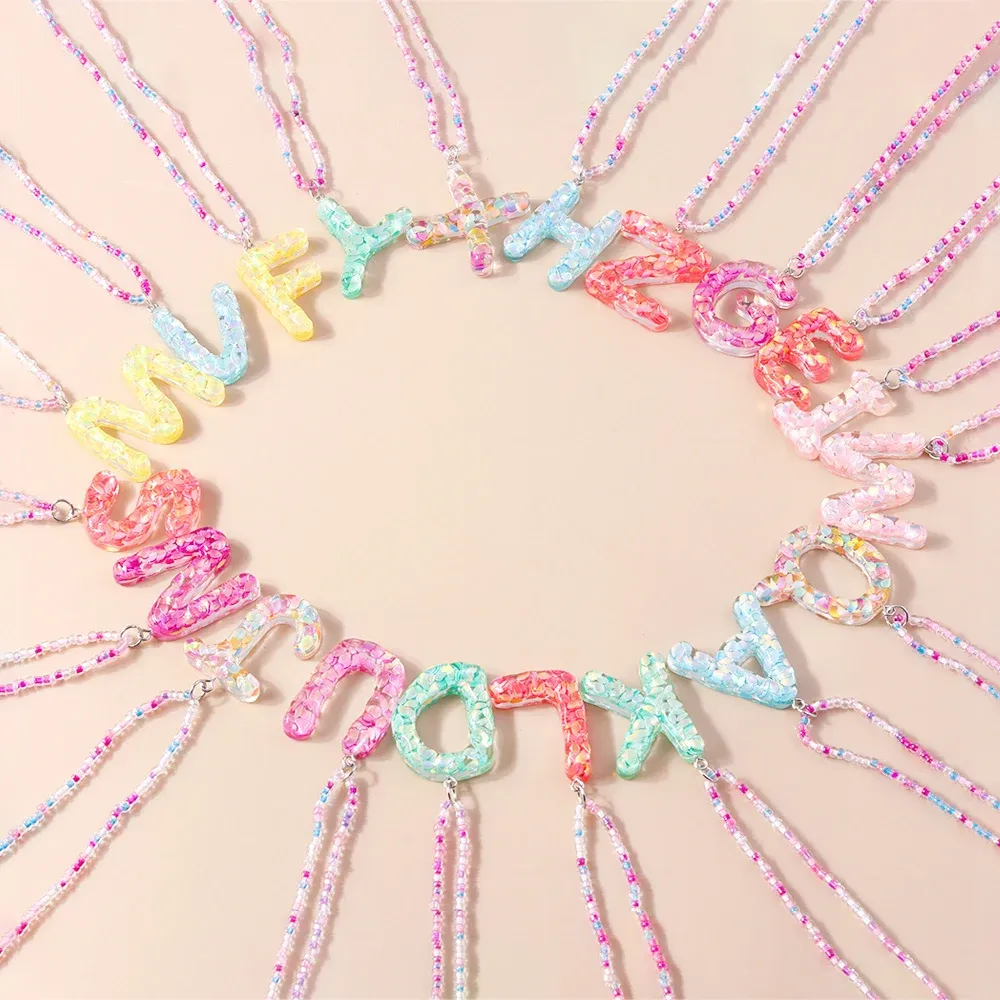 Boucles d'oreilles résine lettres florales 26 initiales