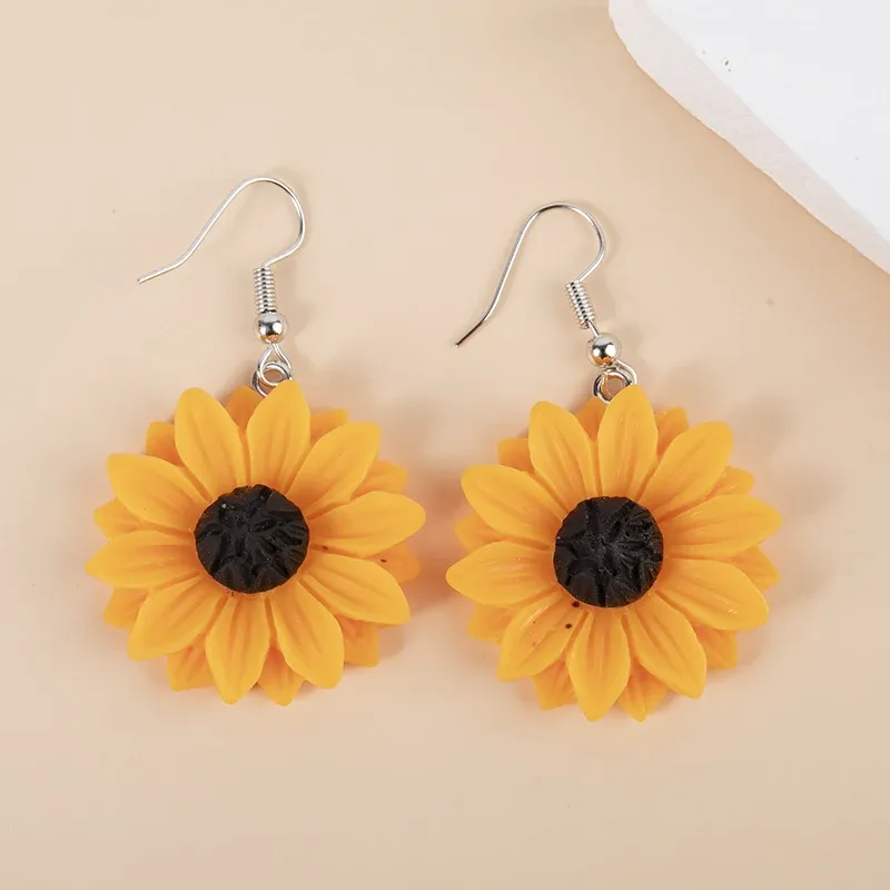 Boucles d'oreilles résine marguerite tournesol 15 à 30 mm