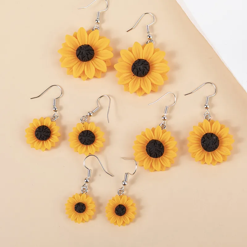 Boucles d'oreilles résine marguerite tournesol 15 à 30 mm