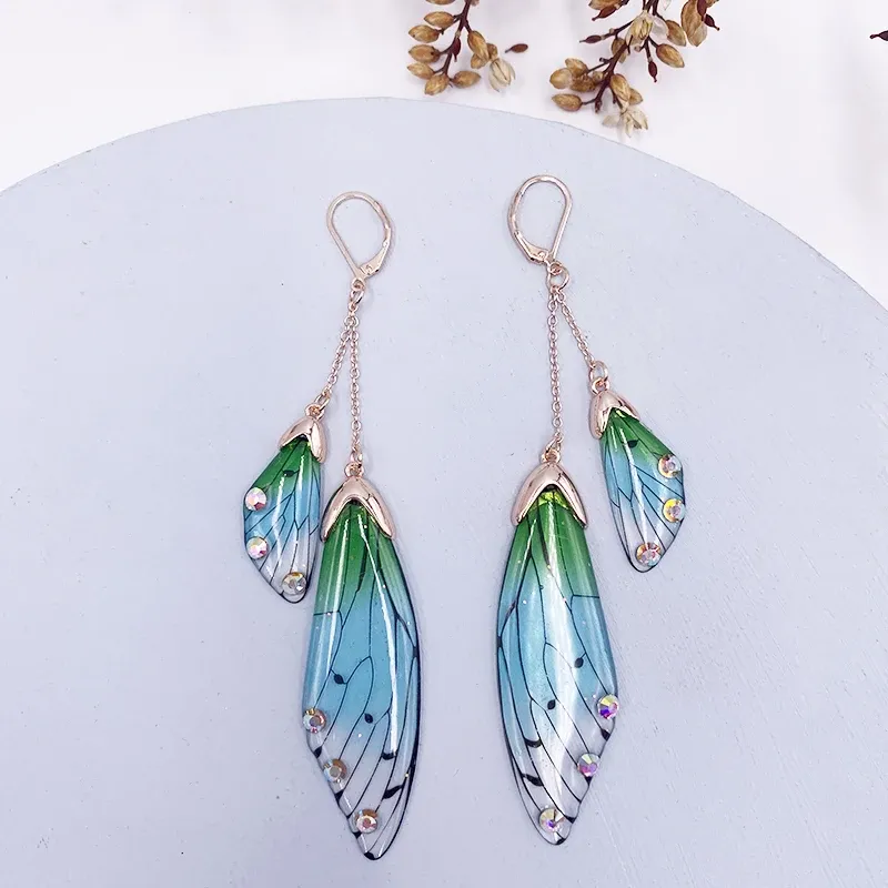 Boucles d'oreilles résine papillon double aile émail