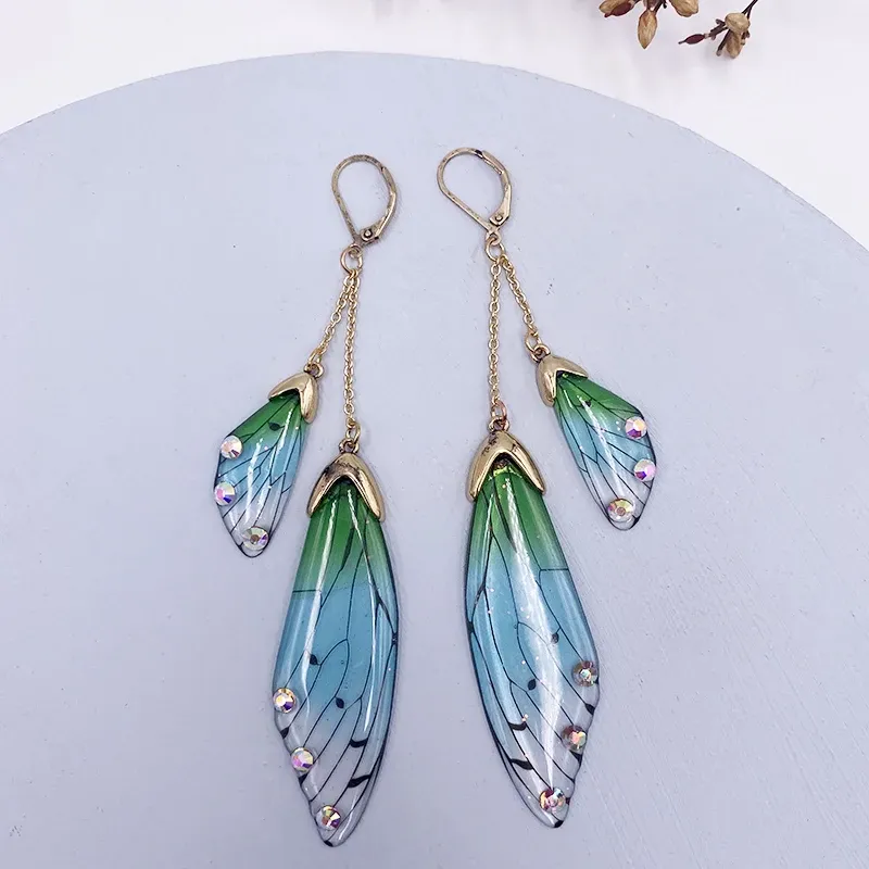 Boucles d'oreilles résine papillon double aile émail