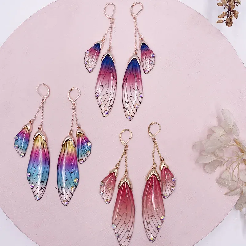Boucles d'oreilles résine papillon double aile émail