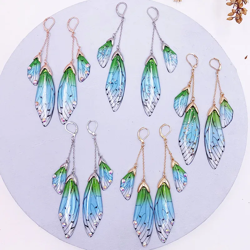 Boucles d'oreilles résine papillon double aile émail