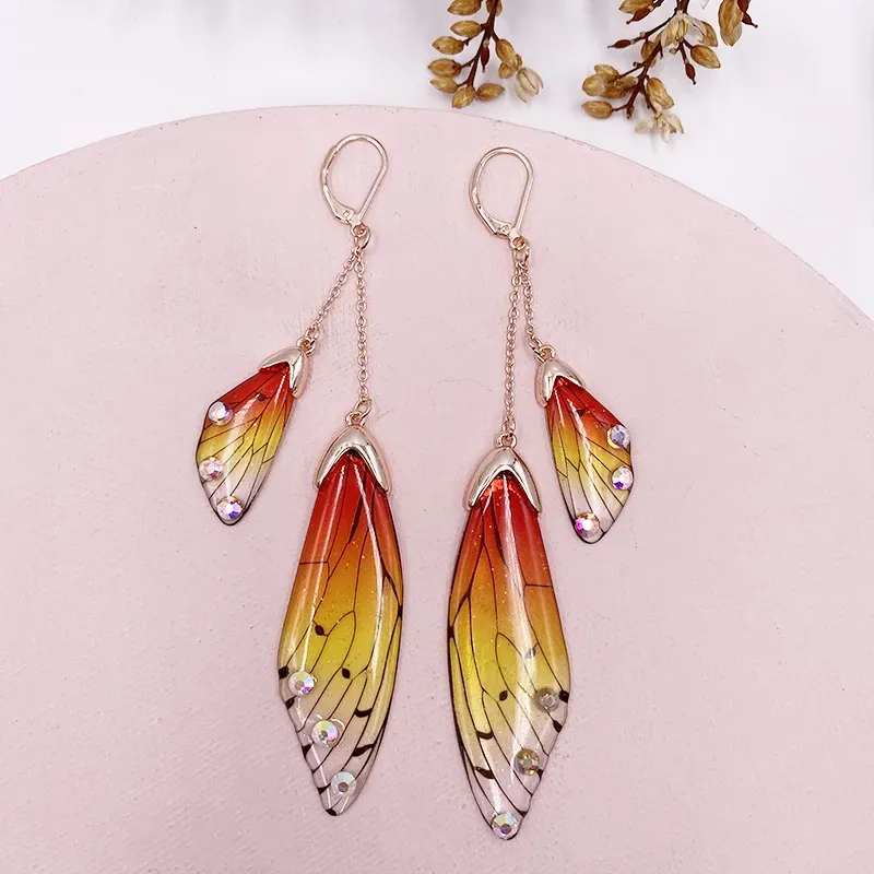 Boucles d'oreilles résine papillon double aile émail
