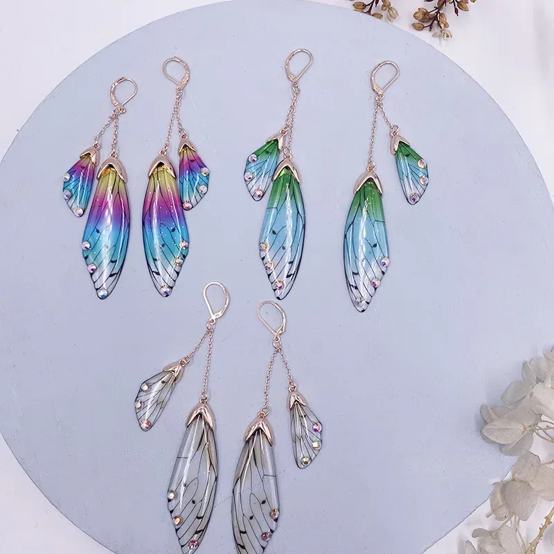 Boucles d'oreilles résine papillon double aile émail