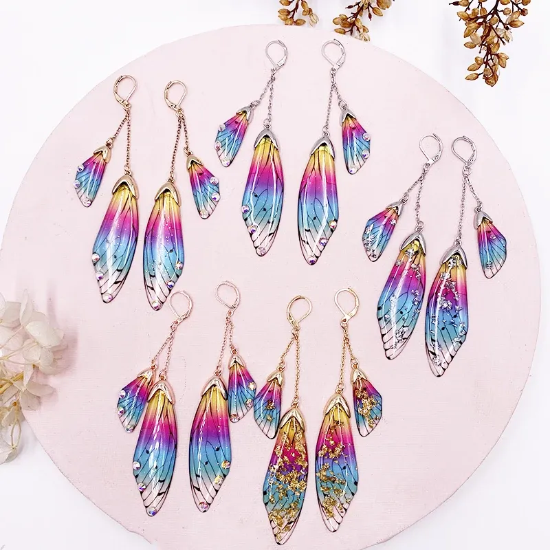 Boucles d'oreilles résine papillon double aile émail
