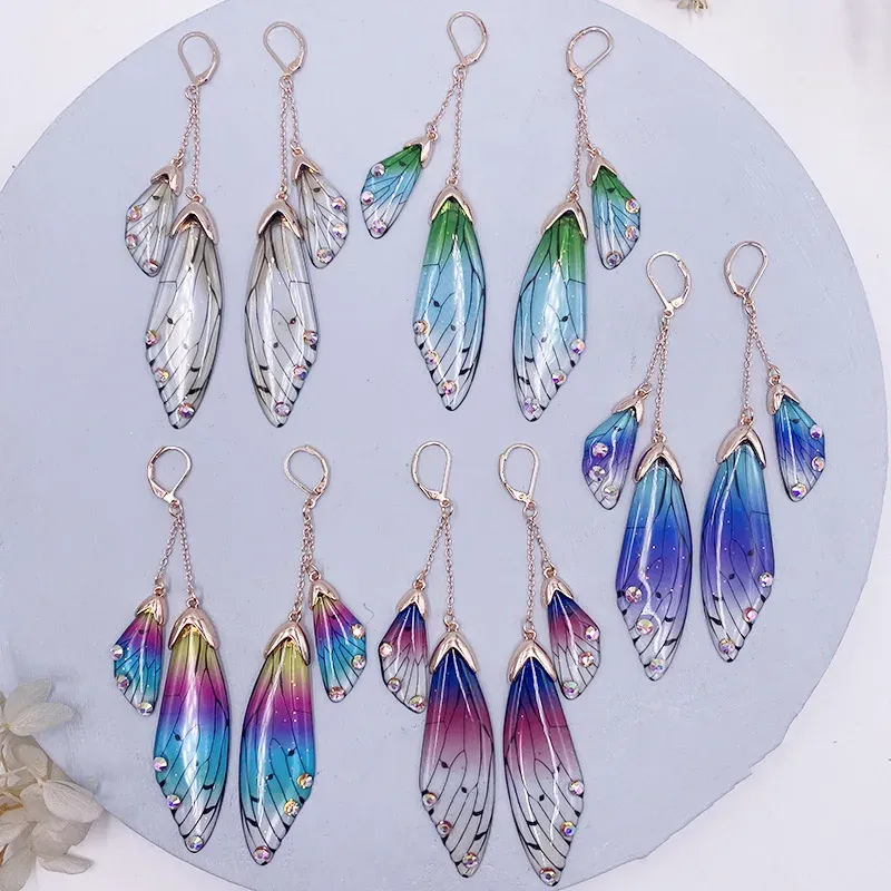 Boucles d'oreilles résine papillon double aile émail