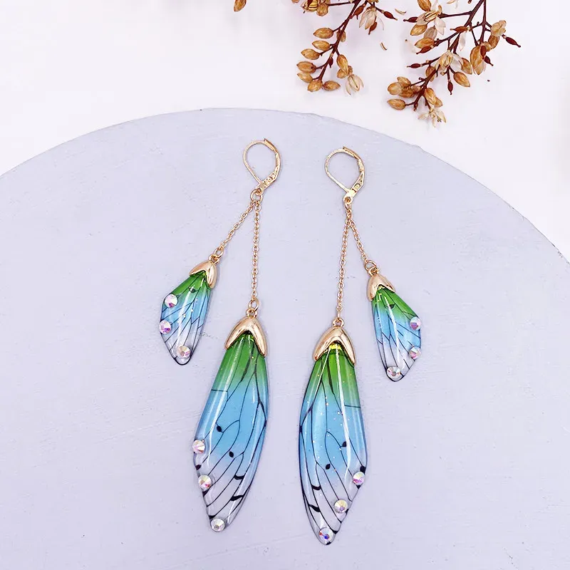 Boucles d'oreilles résine papillon double aile émail