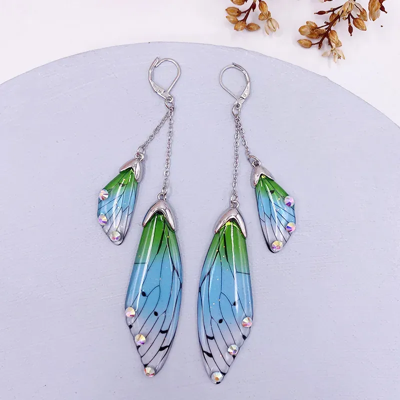 Boucles d'oreilles résine papillon double aile émail