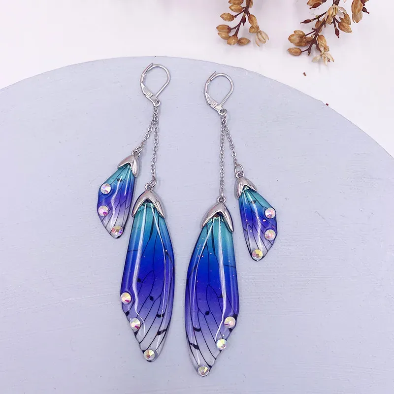 Boucles d'oreilles résine papillon double aile émail