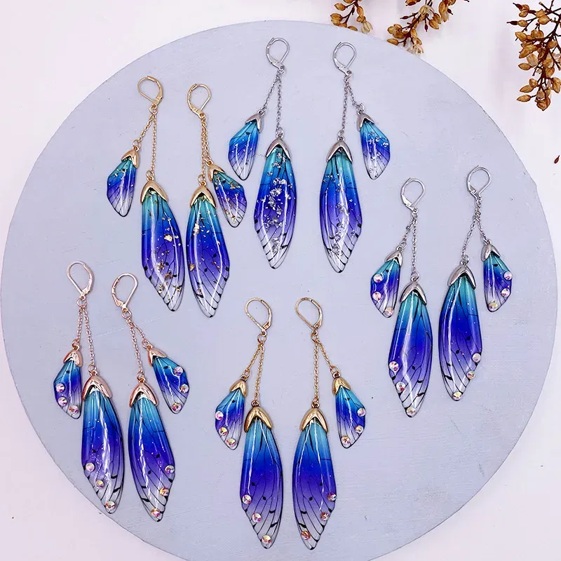 Boucles d'oreilles résine papillon double aile émail