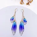 Boucles d'oreilles résine papillon double aile émail – Couleur du métal Gold-Blue