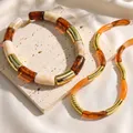 Collier résine ambre marron tube acier inoxydable – 2