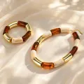Collier résine ambre marron tube acier inoxydable – 5