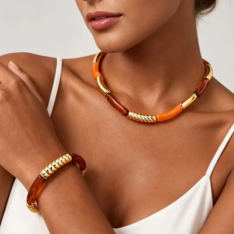 Collier résine ambre marron tube acier inoxydable
