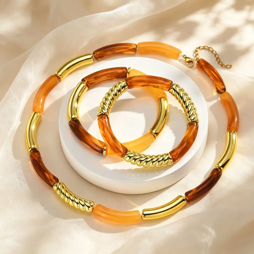 Collier résine ambre marron tube acier inoxydable