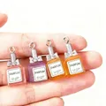 Lot de 10 pendentifs résine bouteille parfum pour bijoux – 1