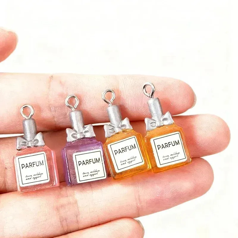 Lot de 10 pendentifs résine bouteille parfum pour bijoux