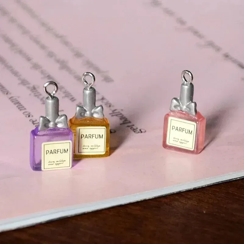 Lot de 10 pendentifs résine bouteille parfum pour bijoux