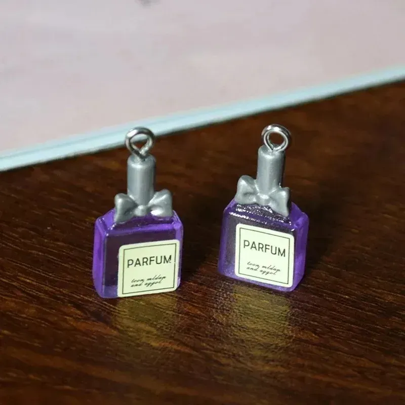 Lot de 10 pendentifs résine bouteille parfum pour bijoux