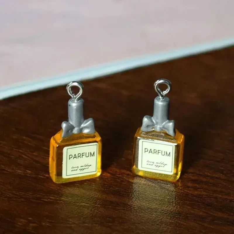 Lot de 10 pendentifs résine bouteille parfum pour bijoux