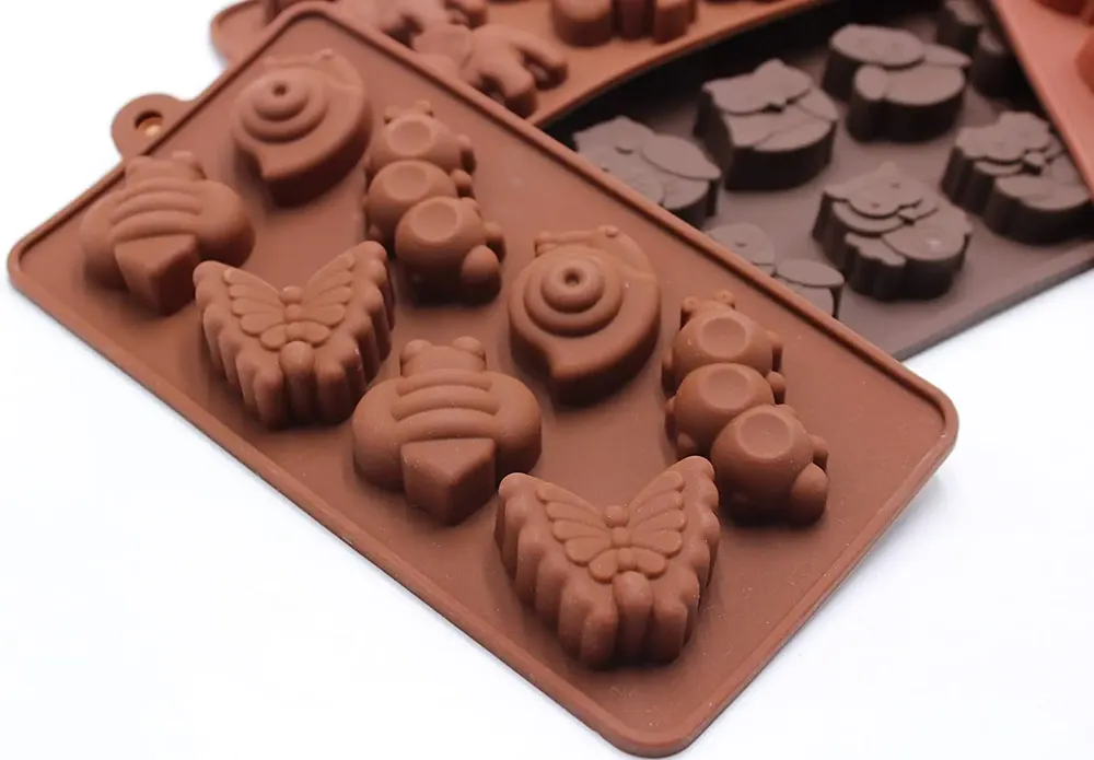 Lot de 2 moules silicone animaux et véhicules pour chocolats