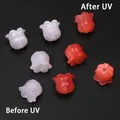 Lot de 2 perles résine lys UV 11x12mm pour bijoux – Couleur Orange 2pcs