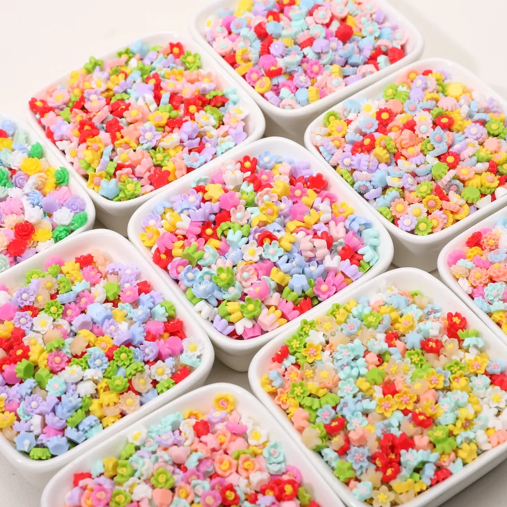 Lot de 50 breloques résine mini fleurs sans trou pour bijoux