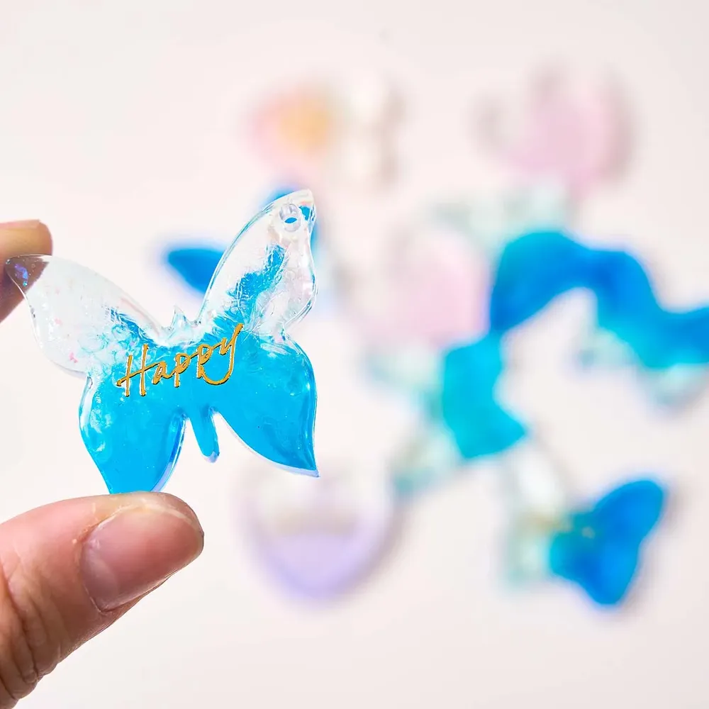 Moule silicone 6 cavités boucles d'oreilles cœur papillon