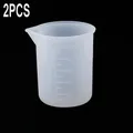 Tasse mesure silicone 100ml avec bâtonnet silicone – Couleur 2pcs